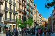 View of Portal del Angel, most visited pedestrian street in large shopping area of Barcelona on sunny summer day, Spain