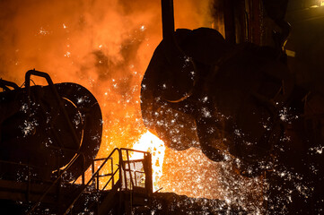 The process of pouring molten steel into a metallurgical furnace