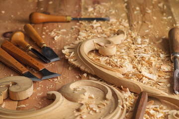 Canvas Print - Wood processing. Joinery work. Wood carving. Chisels for carving on the woodworker desk