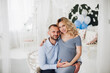 © Вячеслав Косько - Couple handsome man and pregnant woman taking self portrait.
