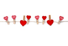 Clothespins With Red Hearts On Rope Isolated On White Background. Top View. Greeting Card.