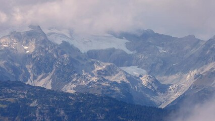 Wall Mural - glacier and mountain landscape view of mountains seen from whistler mountain top gondola, bc, canada