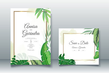 Wall Mural -  Elegant wedding invitation card with tropical leaves template Premium Vector