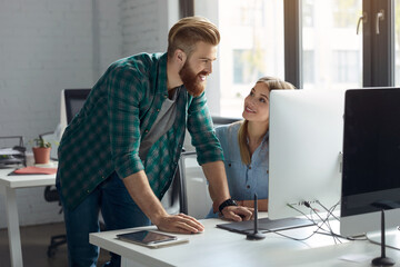 Wall Mural - Business man and business woman working at office