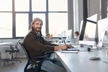 Wall Mural - Business man writing in graphics tablet at office