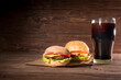 Homemade burger and Cold drink cola on wooden background