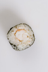 Wall Mural - one sushi maki on white background