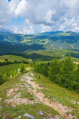 Wall Mural - hiking trail on a ridge in a beautiful landscape