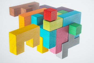 Abstract construction from wooden blocks. The concept of logical thinking..