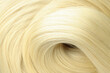 © Atlas - Blonde female hair on whole background, close up