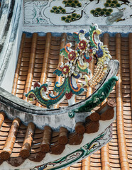 Wall Mural - Chonburi, Thailand - 05 Feb 2022 : Grand roof architecture of Chinese style temple in Wihan Thep Sathit Phra Ki Ti Chaloem ( San Chao Na Cha ). Selective focus.