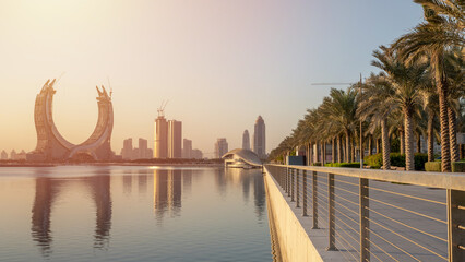 The beautiful newly developing city with many skyscrapers , shot during sunrise