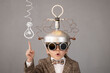 © Sunny studio - Smart child wearing funny helmet with illuminated lightbulb