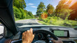 © AA+W - hands of car driver on steering wheel, road trip, driving on highway road