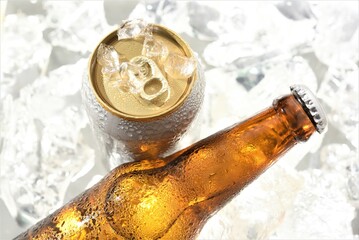 beer bottle with beer can chilled in ice