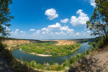 Panorama of the tract Krivoborye, Ramonsky district of the Voronezh region. Steep forested sandy slope of the Don River