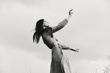 portrait of a beautiful woman in dress dramatic style emotions posing Lifestyle