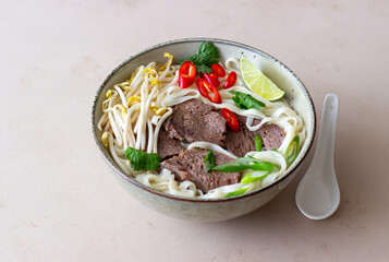 Pho Bo vietnamese soup with beef. Asian food. National cuisine.