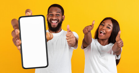 Poster - Black couple showing empty smartphone screen and thumbs up