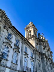 Wall Mural - A low angle of old architecture in Braga, Portugal under a blue sky