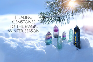 Wall Mural - crystals and pine branch on snow, natural winter background. minerals for esoteric Crystal Ritual, Witchcraft, spiritual practice. reiki therapy. text - Healing Gemstones to the magic Winter season