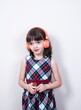 © gmstockstudio - Little girl using the earphones