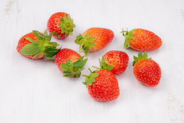 Wall Mural - Fresh ripe strawberries isolated on white background