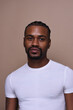 © Cultura Creative - Studio portrait of young man wearing t-shirt