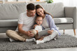 © Prostock-studio - Happy Young Family Of Three With Infant Son Relaxing With Digital Tablet