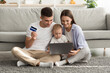 © Prostock-studio - Online Purchases. Family With Infant Baby Using Laptop And Credit Card