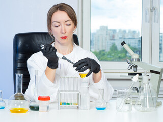 Poster - Medical laboratory assistant. Doctor in medical laboratory. Woman is sitting at table with laboratory equipment. Microscope and test tubes in front of doctor. Prescription drug preparation concept