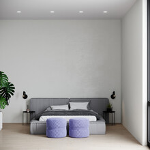 Spacious Large Bedroom Mockup. White Plaster Wall, Gray Bed And Bright Pouffes. Accent Ottomans - Veri Peri's Color Of The Year 2022. Design Interior Home. 3d Rendering