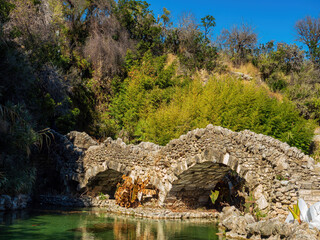 Wall Mural - Sunny view of the stone brdige in Japanese Tea Garden