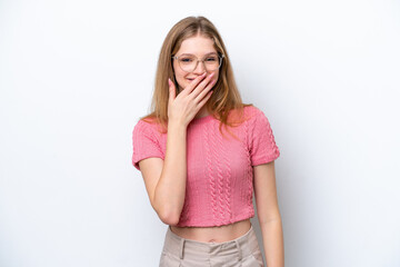 Teenager Russian girl isolated on white background happy and smiling covering mouth with hand