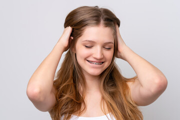 Teenager Russian girl isolated on white background with happy expression. Close up portrait