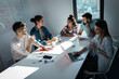 © BalanceFormCreative - Group of software developing workers and programmers on meeting. They discuss future projects at the conference room.