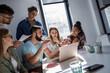 © BalanceFormCreative - Software developing workers at a meeting  in conference room. They discuss future projects.