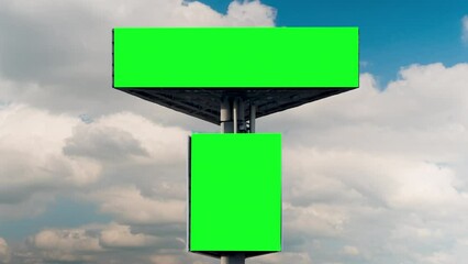 Wall Mural - timelapse: two blank green billboards or large displays and moving white clouds against blue sky - f