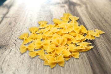 Wall Mural - raw macaroni pasta noodles. Food concept