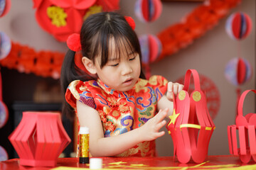 young chinese girl making traditional chinese 