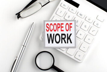 Poster - SCOPE OF WORK text on the sticker with calculator, glasses and magnifier