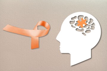 Poster - World Multiple Sclerosis Day. Orange awareness ribbon and brain symbol on a background.