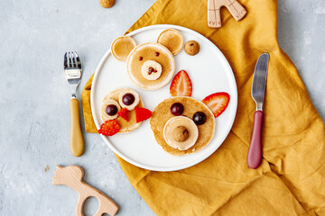 Colorful breakfast meal for kids. Funny Easter food art, top view. Concept of healthy eating, baby food, healthy breakfast food