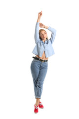 Wall Mural - Fashionable young woman in stylish jeans clothes on white background