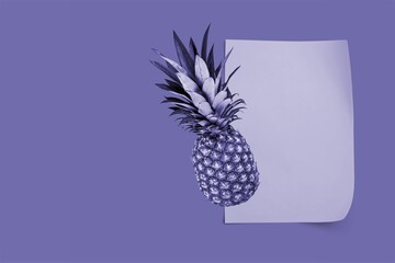 Wall Mural - Fresh juicy tropical fruit pineapple on violet background. Creative card in trendy color 2022 Very Peri.