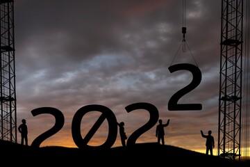 Wall Mural - Silhouette staff works as a to prepare to welcome the new year 2022 on construction site