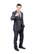 © Iván Moreno - Businessman showing like gesture in studio. White background.