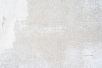 Wall Mural - Background with a concrete wall with a fine texture in a house under construction.