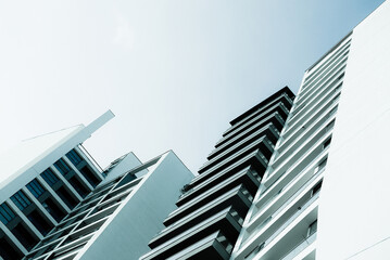 Wall Mural - Blue monochrome image of modern multistory residential buildings