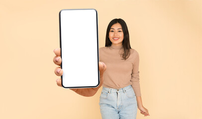 Lady showing white empty smartphone screen, closeup